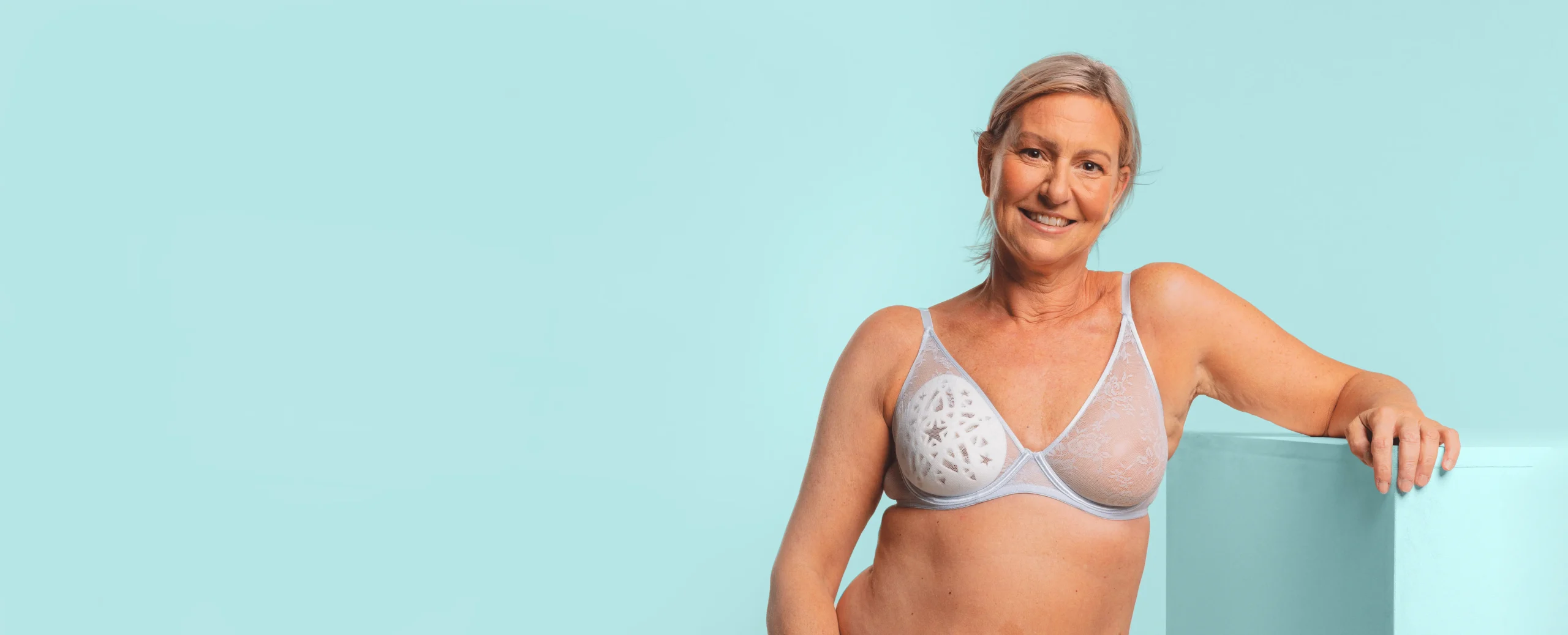 Mastectomy model wearing Boost breast form